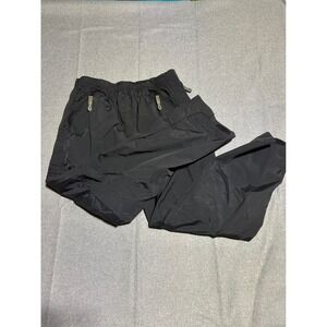 REI Hiking RainPants Women Large Black Elastic Waist Zipper Pockets Outdoor